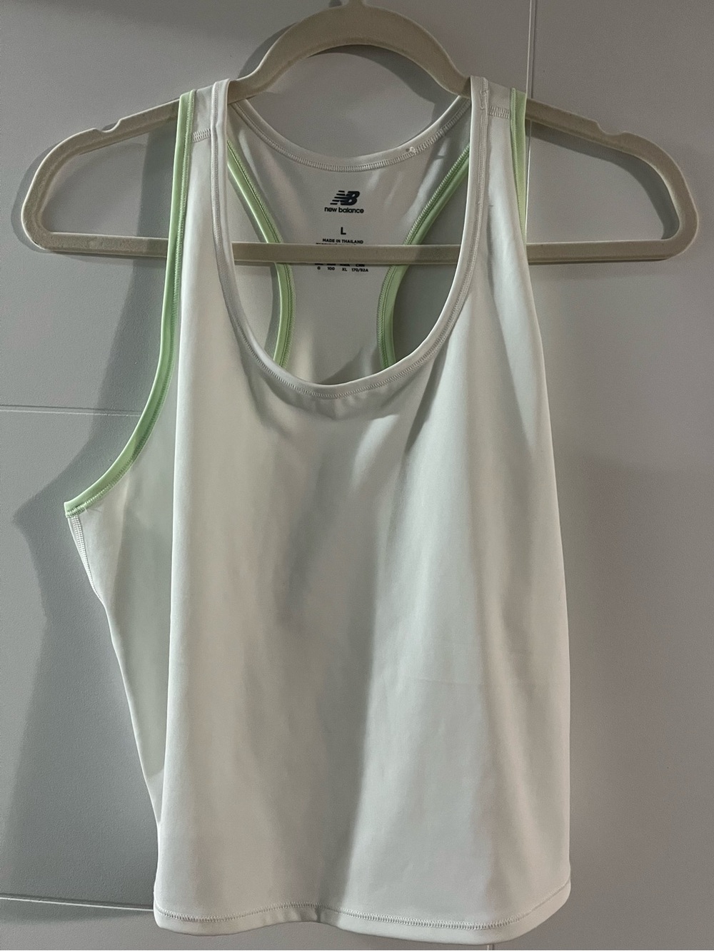New Balance Womenβs White Tank with Pale Green Trim